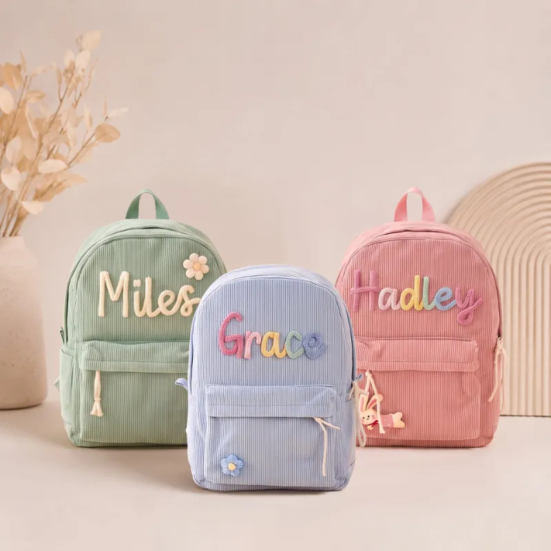 MamaRaya pink corduroy backpack