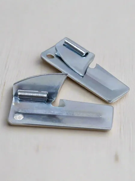 P-38 can opener lying flat on a surface
