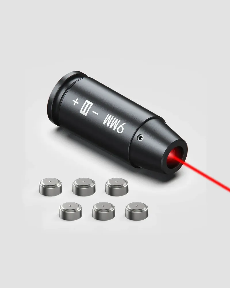 9mm bore sight laser cartridge inserted into a pistol chamber